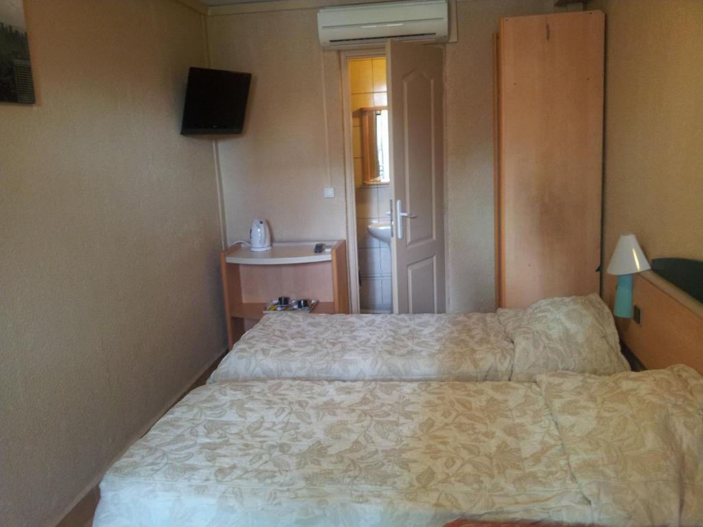 Hotel Royal Colombes Aulnay-sous-Bois Quarto foto